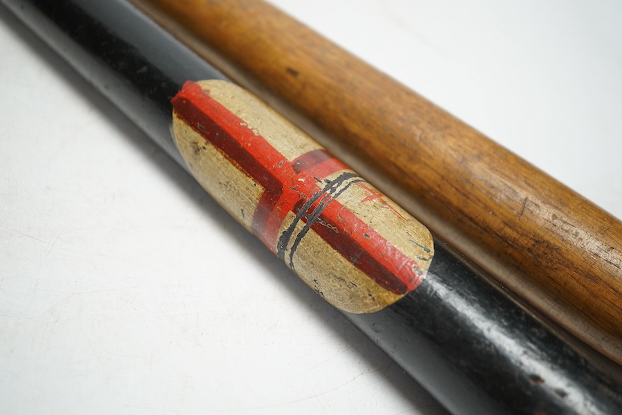 Two early 20th century truncheons, one painted with the Saint Georges Cross, 46cm. Condition - fair to good